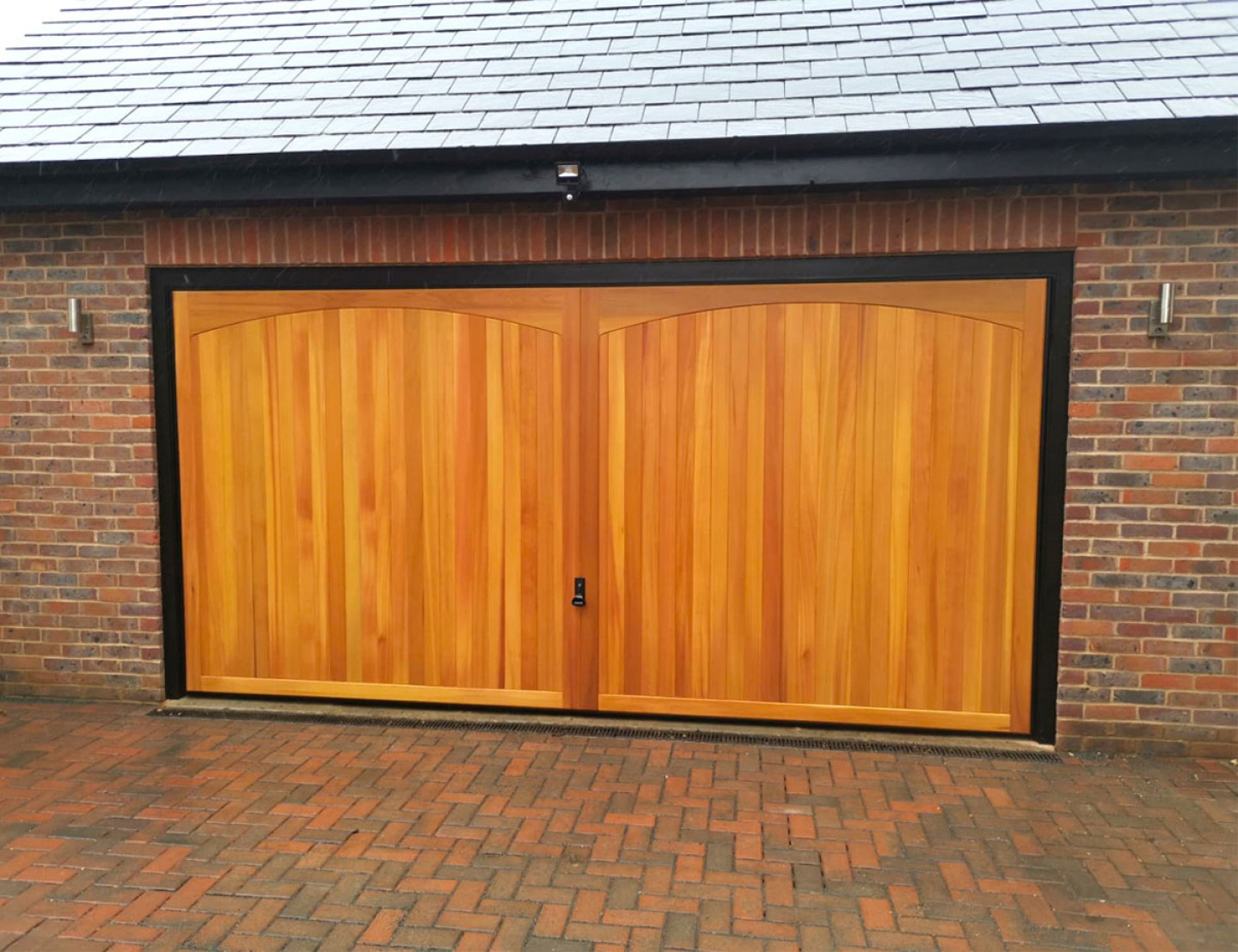 Extra wide garage doors are now a major feature in modern builds. Left, the Garage Door Worshop in Bedfordshire  recently installed this stand out wooden double Garador door.