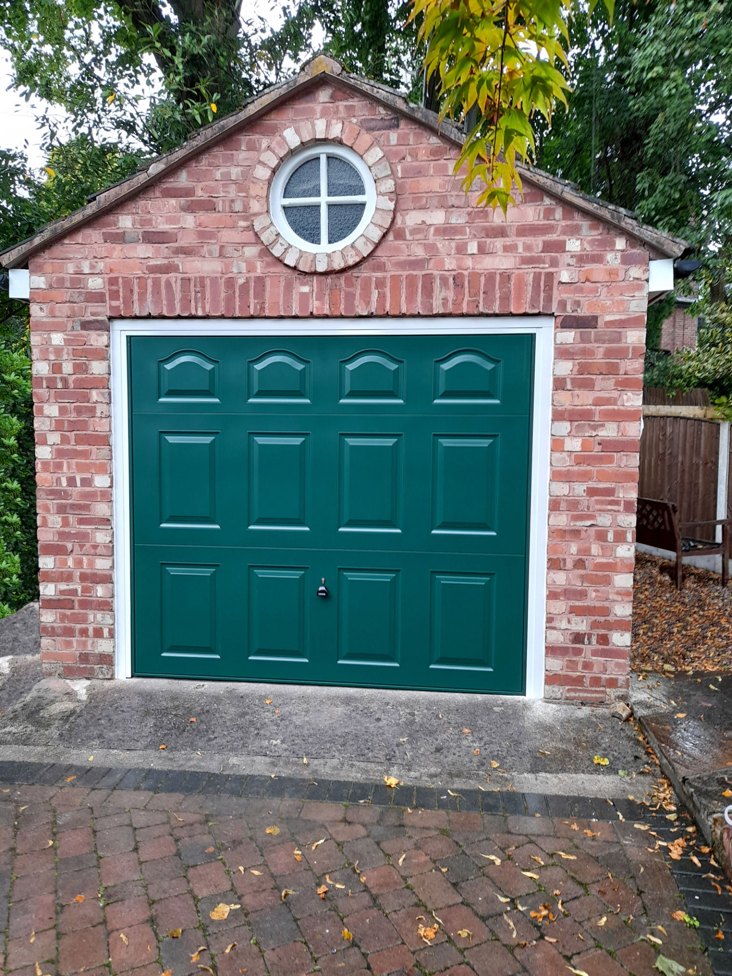 Cathedral steel up & over garage door in Fir Green, fitted by Carrington Doors
