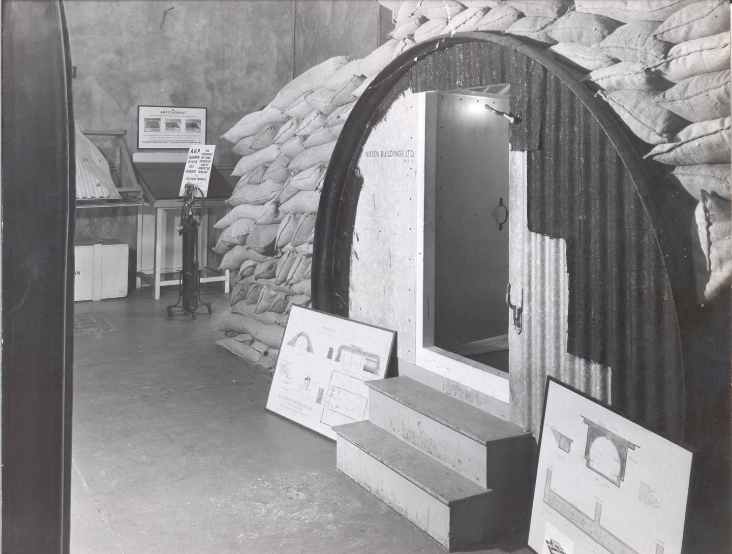 1938 – The Nissen Hut centrepiece in the air raid precautions exhibition,158 Bond Street  © Building Centre