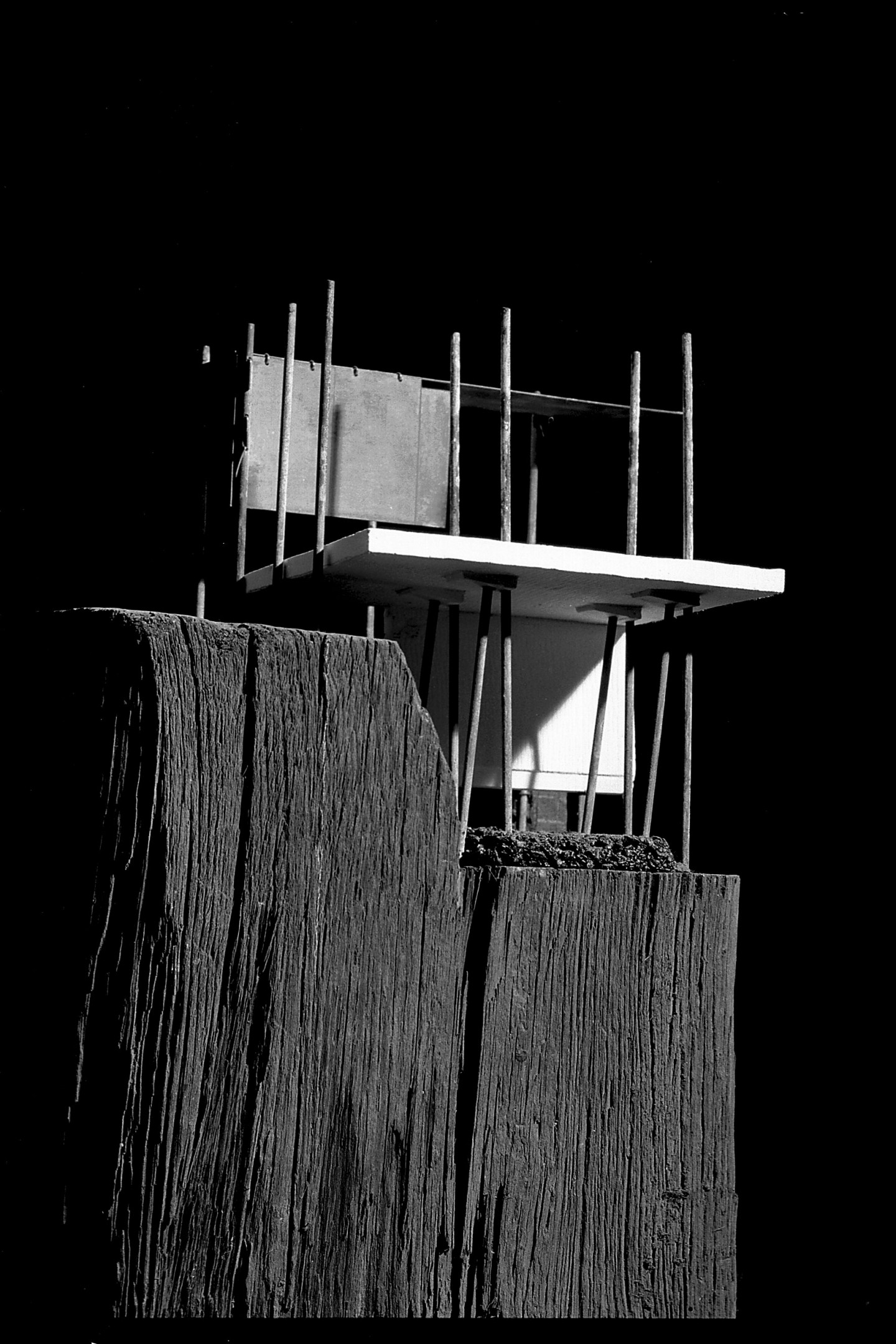 Model Study of Spatial and tectonic potentials by Gomes + Staub Architects, made from weathered timber, copper wire, foamboard, gypsum plaster and asphalt.