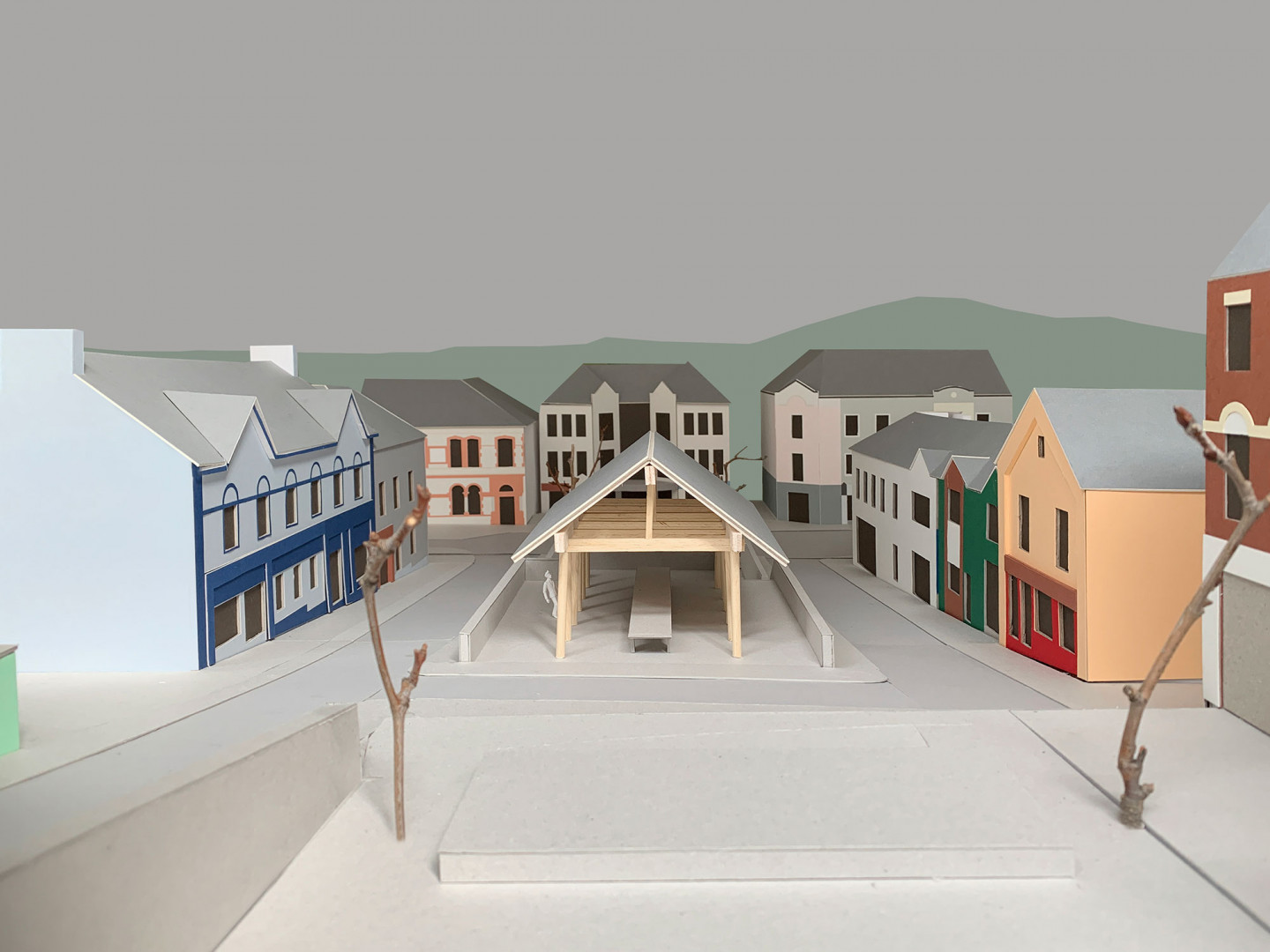 Proposal for an intervention in Market Square in Letterkenny by Howland Evans Architects, made from foamboard, greycard, coloured paper, balsa wood, glue and double-sided tape.